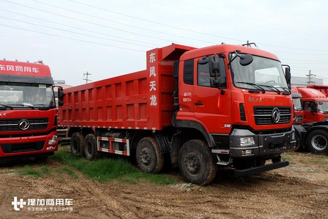 东风天龙kc自卸车385,东风天龙kc385自卸车 350马力发动机设计载重75吨前四后八的东风天龙kc自卸车实拍