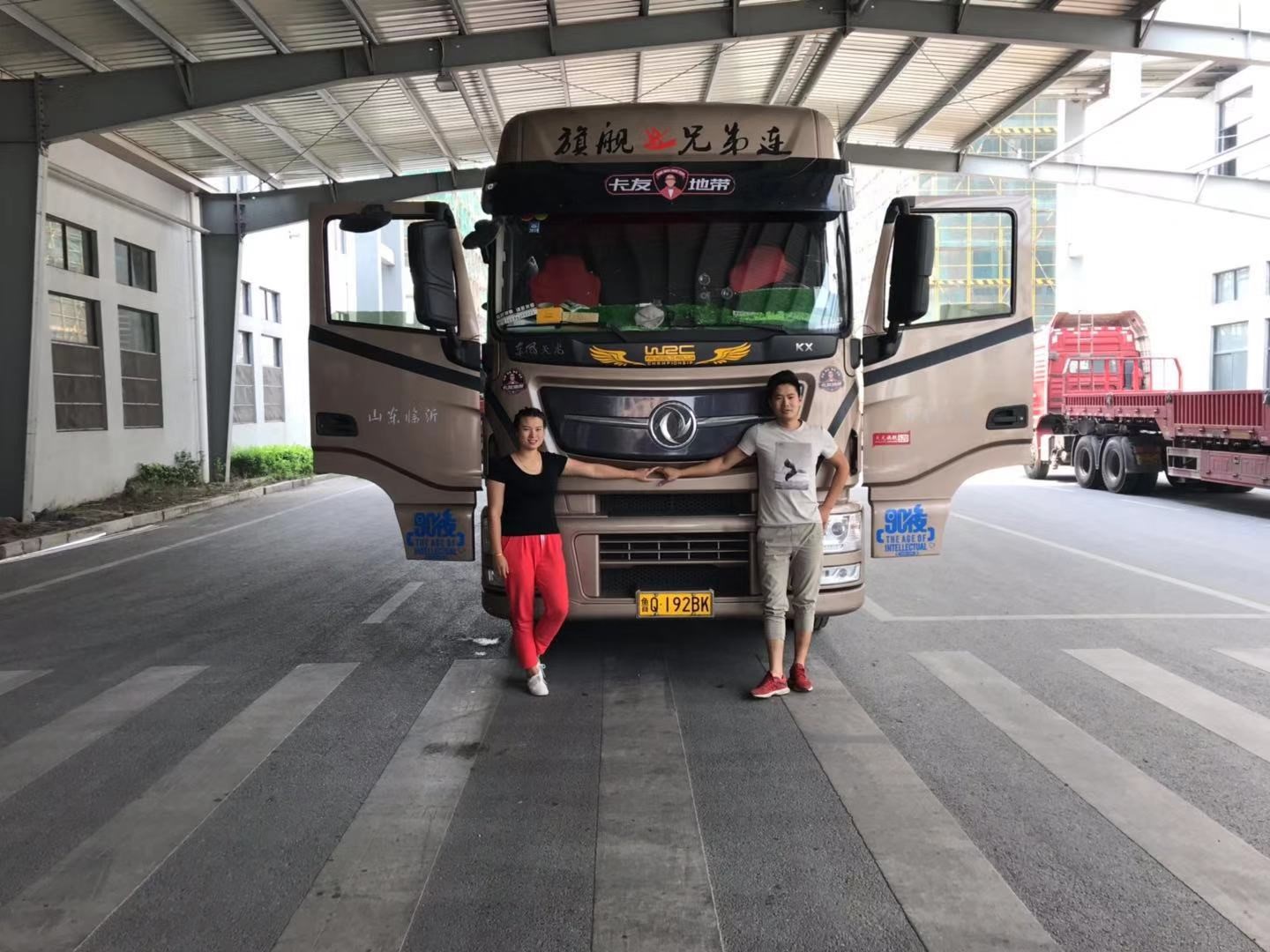 首位周明星车主张亚萍：选择东风天龙KX是一个永不后悔的决定 - 第1张