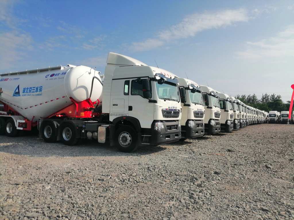 小钢炮闪耀鄂中绿宝石,百台中国重汽豪沃TX牵引车交付湖北京兰集团 - 第2张 - 提加商用车网 小钢炮闪耀鄂中绿宝石,百台中国重汽豪沃TX牵引车交付湖北京兰集团 - 第2张