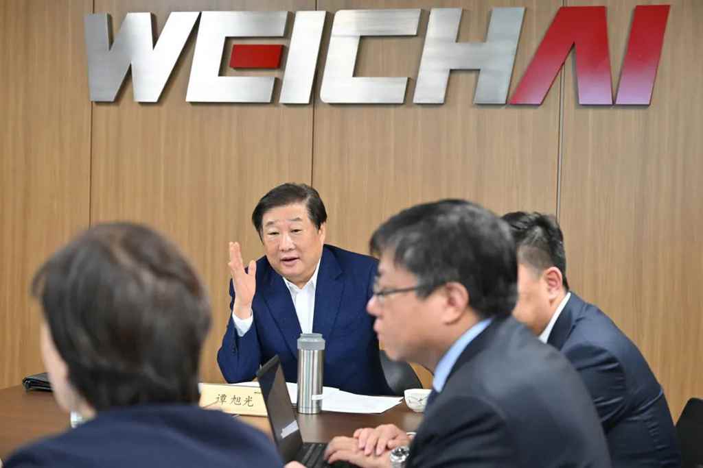 谭旭光：拥抱世界，跑赢未来！