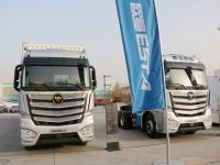 坚决打赢蓝天保卫战 构建物流生态价值链，福田戴姆勒与惠龙易通战略签约&2000台采购顺利举行