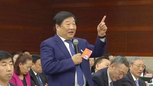 谭旭光两会答记者问,要把中国重汽打造成世界一流品牌